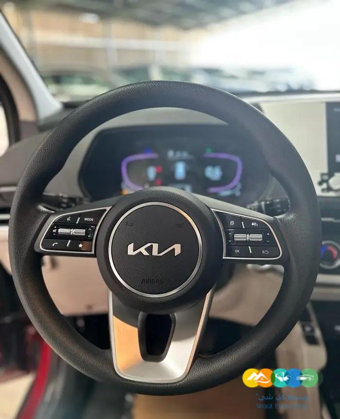 كيا كارينز 2023 ستاندر7 ركاب فضي واحمر