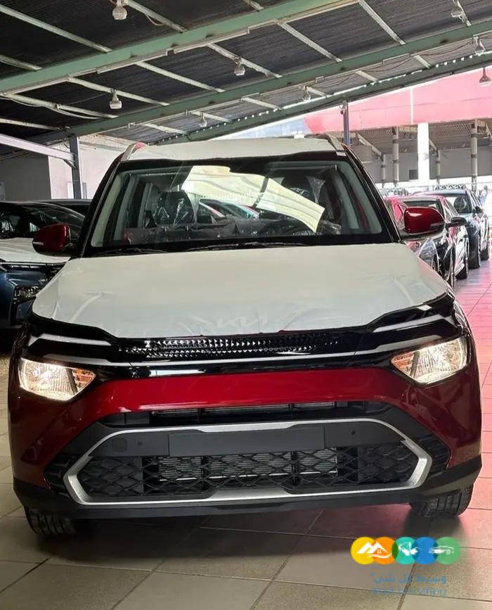 كيا كارينز 2023 ستاندر7 ركاب فضي واحمر