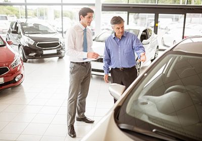 pngtree-a-customer-inspecting-a-vehicle-with-a-sales-representative-photo-image_20329320