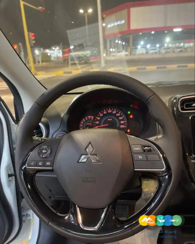 ميتسوبيشي اتراج فل كامل ابيض 2023