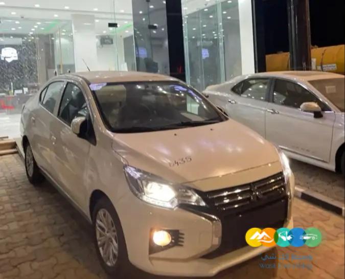 ميتسوبيشي اتراج فل كامل ابيض 2023